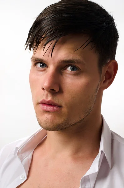 Portrait of a beautiful man posing fashion in a studio — Stock Photo, Image