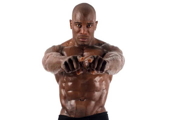 Black bodybuilder pointing to you and asking you to train harder. Strong man with perfect muscles. Isolated on white background — Stock Photo, Image