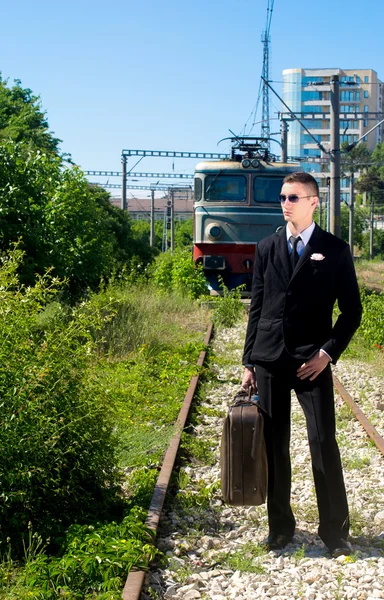 Businessman depressed after loosing his job tries to suicide on the railroad — Stock Photo, Image