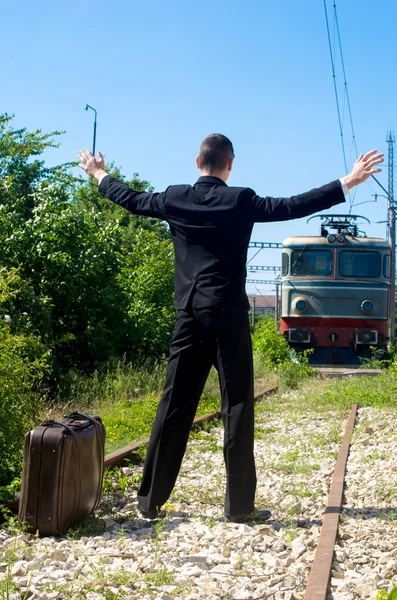 Businessman depressed after loosing his job tries to suicide on the railroad — Stock Photo, Image