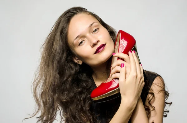 Vrouw in liefde met haar schoenen — Stockfoto