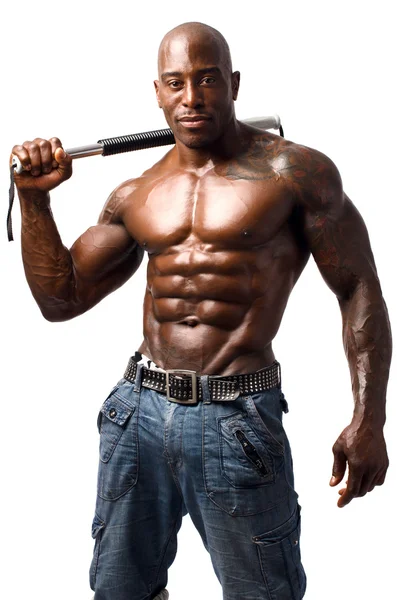 Black bodybuilder training with a bendy bar. Man showing his perfect muscles. Isolated on white background — Stock Photo, Image