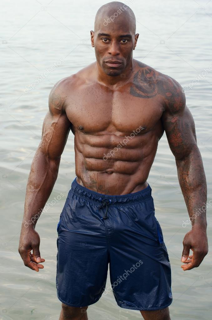 Black bodybuilder relaxing in the water after a hard