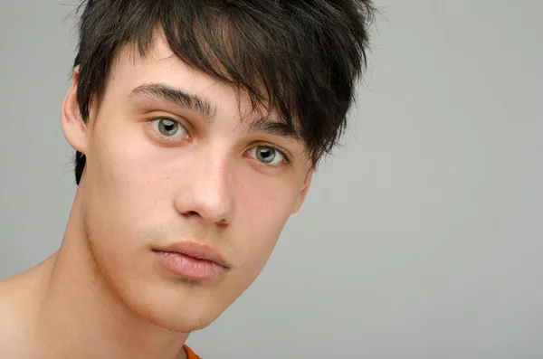 Portrait of an innocent handsome topless man posing fashion. Young guy with cool messy hairstyle — Stock Photo, Image