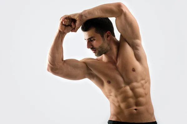 Strong bodybuilder man with perfect abs, shoulders,biceps, triceps and chest — Stock Photo, Image