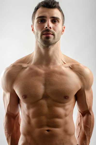 Strong bodybuilder man with perfect abs, shoulders,biceps, triceps and chest — Stock Photo, Image