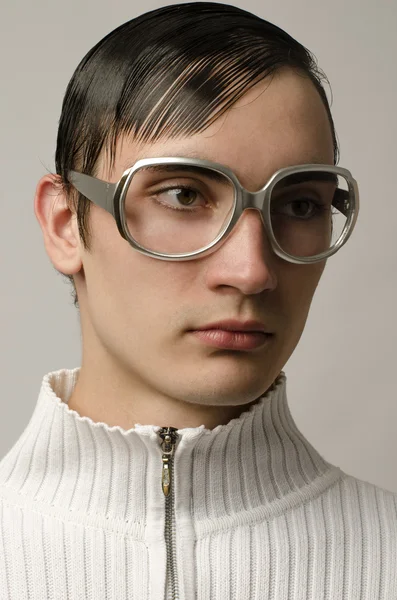 Beautiful man wearing eyeglasses and looking like a geek — Stock Photo, Image