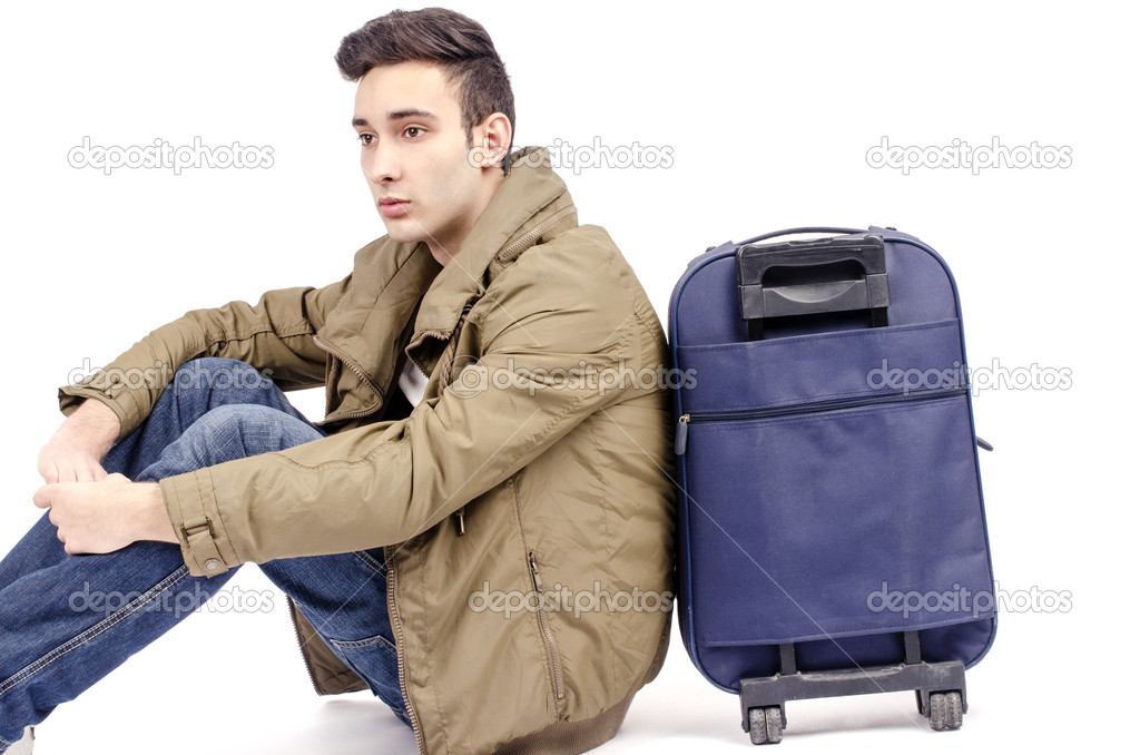 Man carrying a luggage and going in vacation, tourist starting an adventure trip