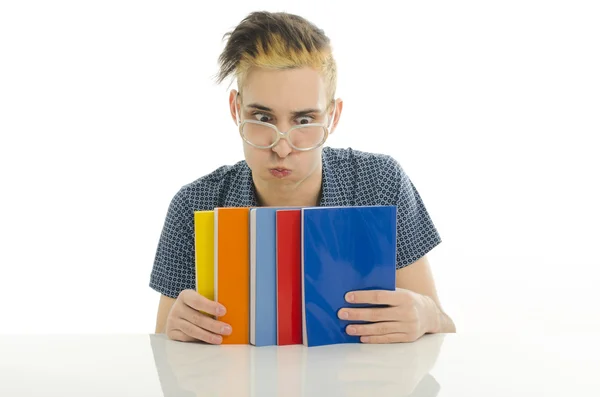 Student with eyeglasses studying for school, man holding many books for reading — Stock Photo, Image