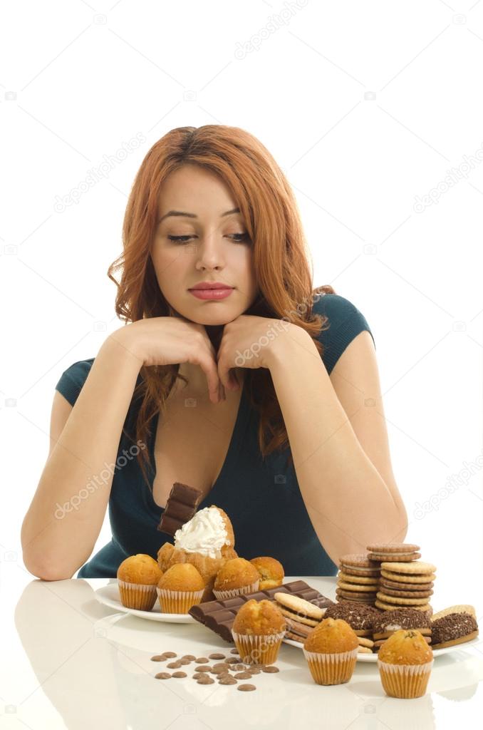 Woman in love with sweets, candies,chocolate and sugar