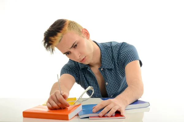 Student with eyeglasses studying for school, man holding many books for reading, geek with crazy hairstyle — Stock Photo, Image