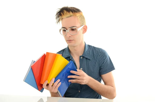 Student with eyeglasses studying for school, man holding many books for reading, geek with crazy hairstyle — Stock Photo, Image