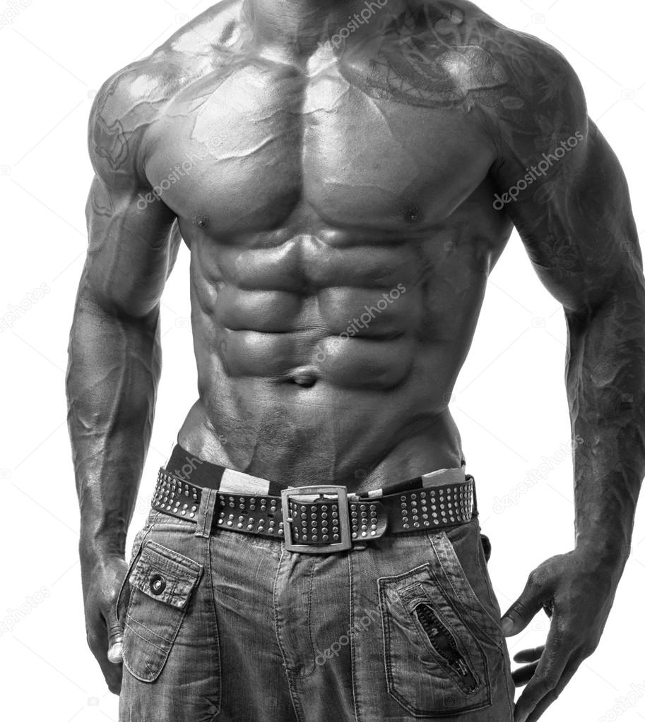 Close up on perfect abs. Strong bodybuilder with six pack