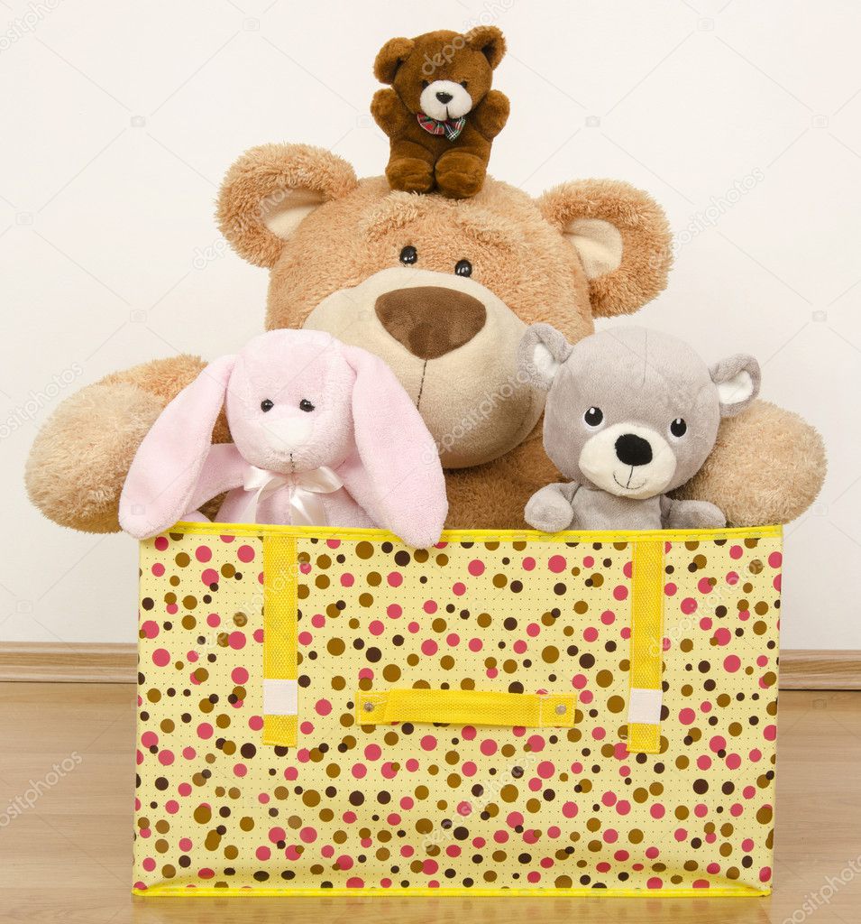 A box full of toys, three bears and a funny rabbit