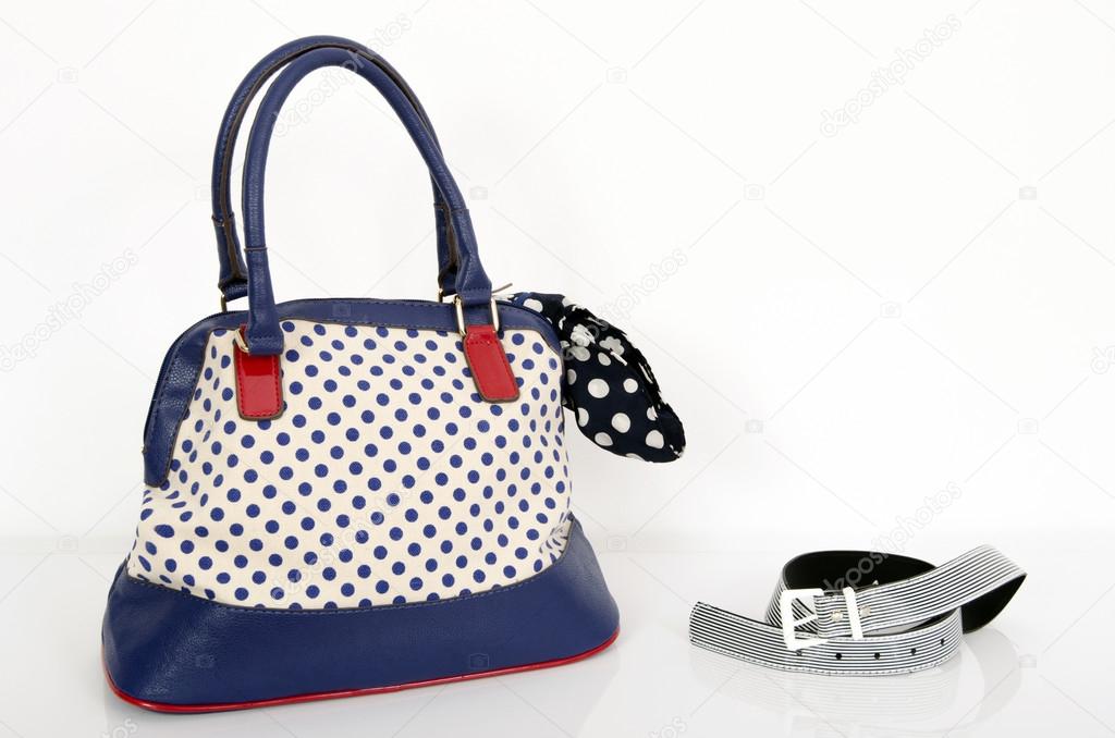 Navy blue polka dots purse and matching accessories.