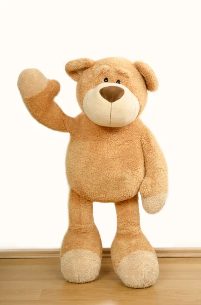 Bear toy waving hello — Stock Photo, Image