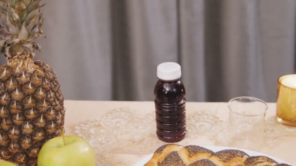 A laid festive table for a meal on Shabbat. Horizontal — Stock Video