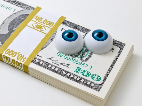 Eyes on the money — Stock Photo, Image