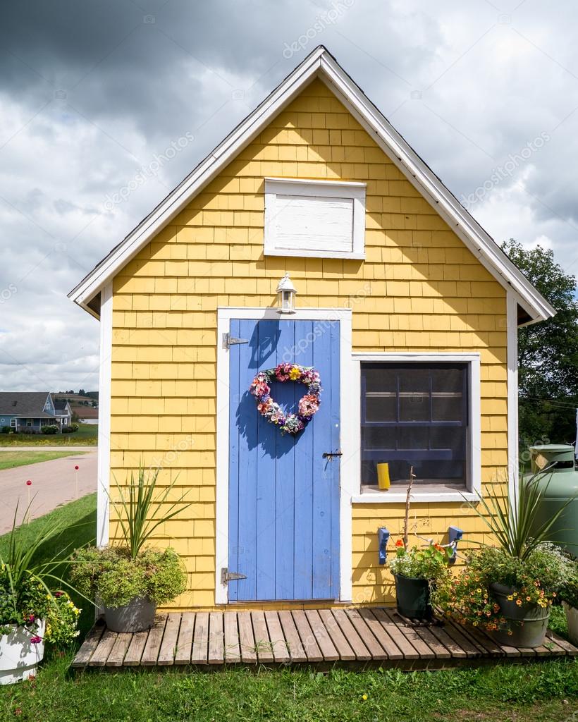 Cute little yellow house