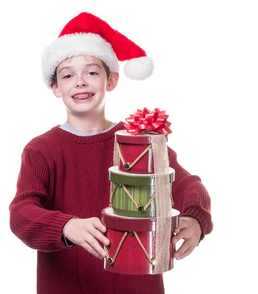 Happy Teen boy carrying Christmas gifts — Stock Photo, Image