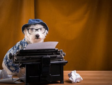 Journalist Dog at the Typewriter clipart