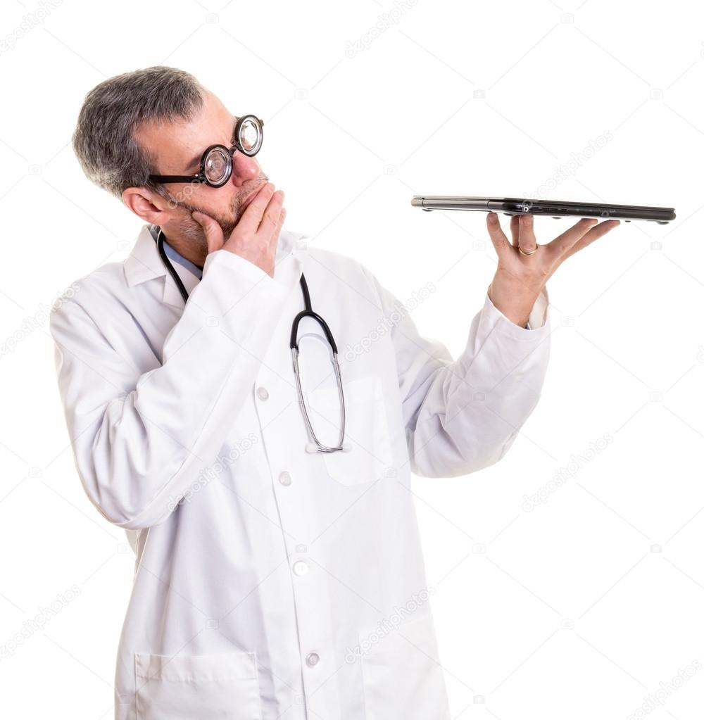 Computer Repair Doctor Examines a laptop