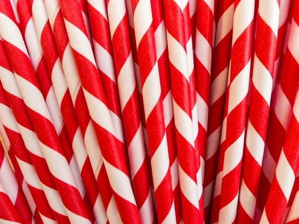 Red and white striped paper drinking straws — Stock Photo, Image