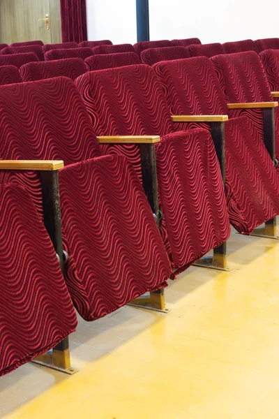 Empty red seats for cinema, theater or conference