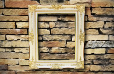 eski tuğla duvar üzerine altın çerçeve