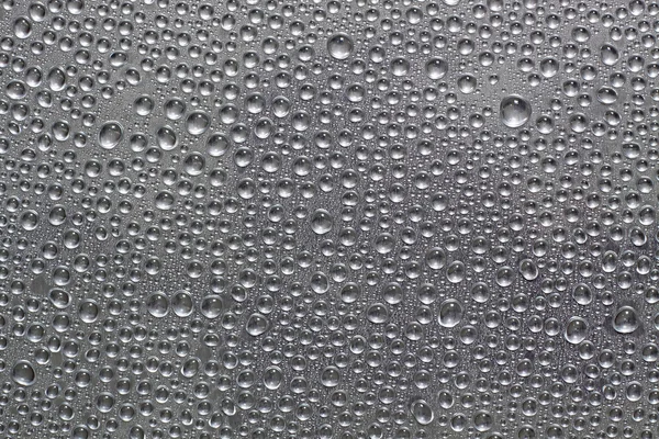 Víz csepp ezüst felületén — Stock Fotó