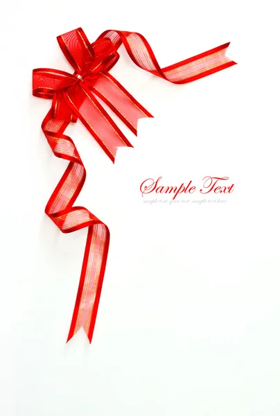 Red ribbon with bow on white — Stock Photo, Image