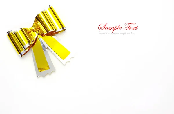Gold bow isolated on white. — Stock Photo, Image