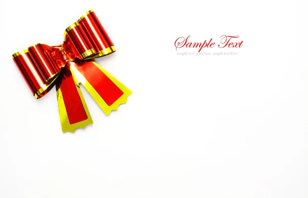 Große rote Feiertagsschleife auf weißem Hintergrund — Stockfoto