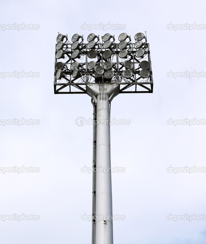A football stadium floodlight with metal pole