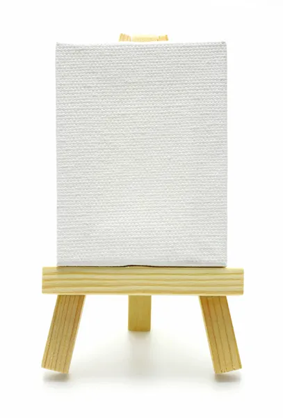 Houten ezel met witte canvas geïsoleerd — Stockfoto