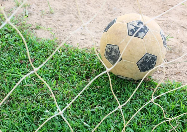 Classic soccer ball on green grass — Stock Photo, Image