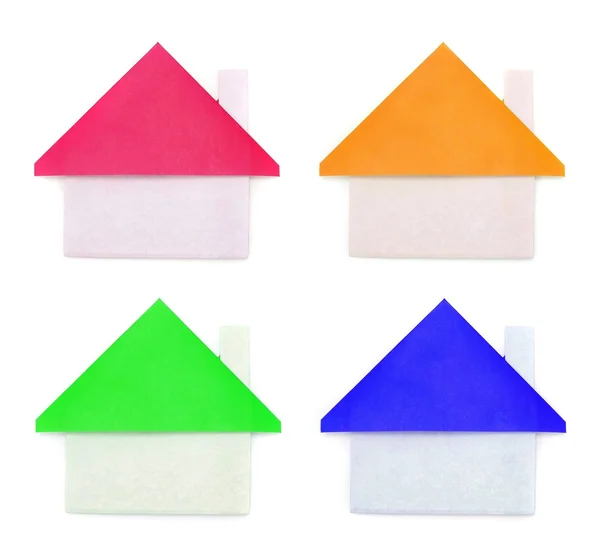 A paper house stands over a white background. — Stock Photo, Image