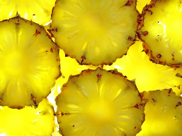 Close up of pineapple slice on white background Stock Image