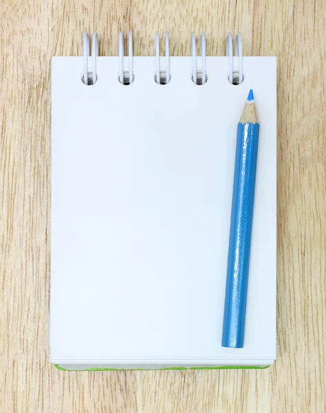 Color Pencil and notebook on Wood — Stock Photo, Image