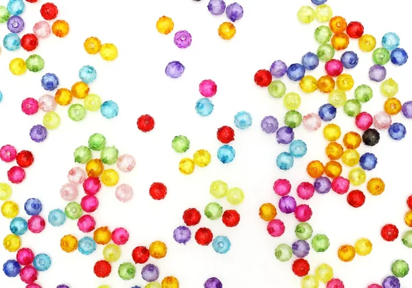 Perline colorate isolate su sfondo bianco — Foto Stock