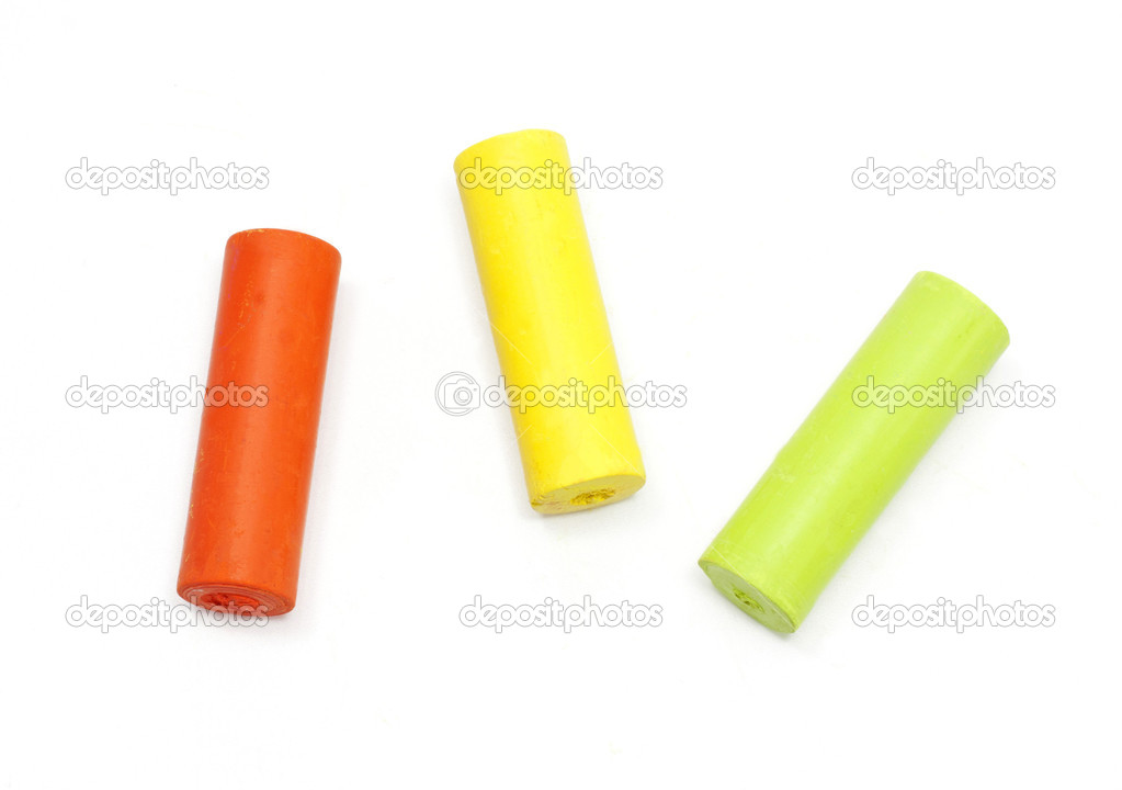 Chalks in a variety of colors on a white background