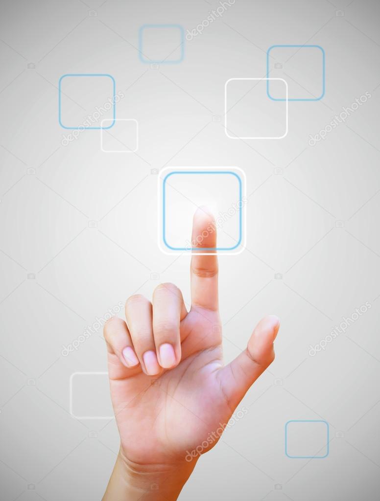Hand pushing a button on a touch screen