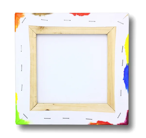 Square canvas on a stretcher, acrylic paint on edge isolated on — Stock Photo, Image