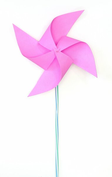 Toy pinwheel on white background