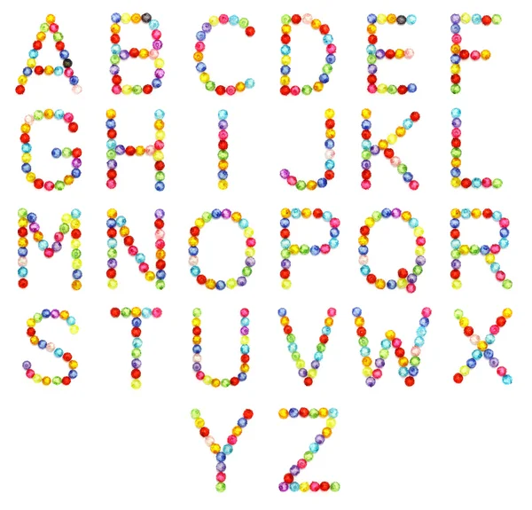 Alphabet made of colorful beads isolated on white background — Stock Photo, Image