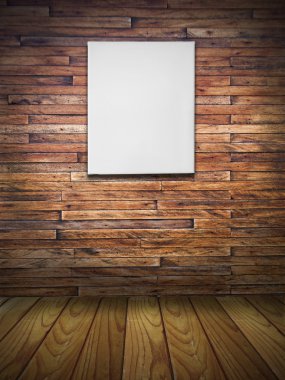 Blank canvas on wood wall in vintage room