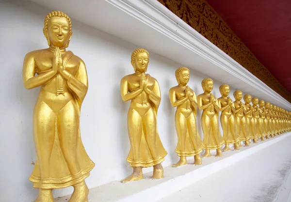 Buddha disciples on white wall — Stock Photo, Image