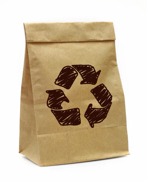 Brown paper bag with recycle sign over white background — Stock Photo, Image