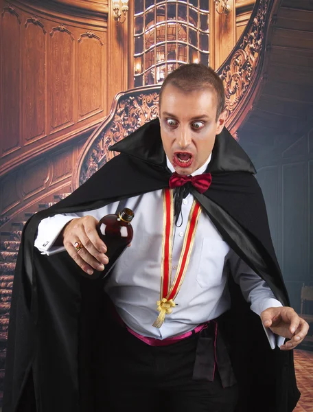 Portrait of a handsome young man in a suit of Count Dracula — Stock Photo, Image