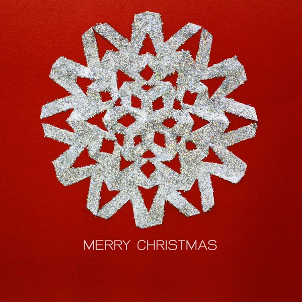 Christmas snowflake on red paper card — Stock Photo, Image